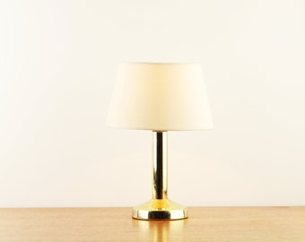 Hollywood Regency design style table lamp with brass base and cream white drum shade - Made by Vandeheg - The Netherlands - ca. 1980s