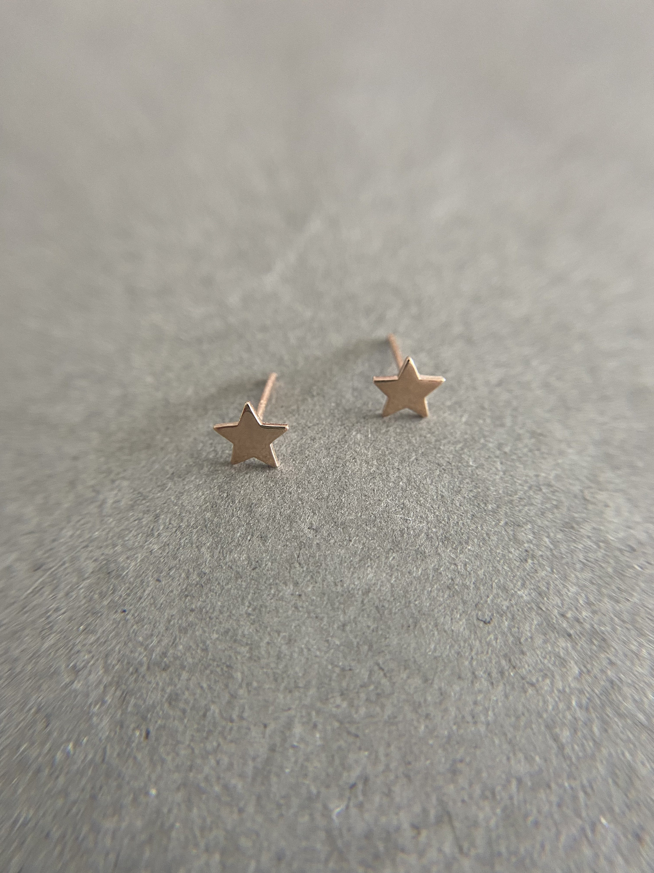 Orecchini a bottone a forma di stella in argento sterling