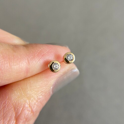 14 kt massief gouden CZ-ring ronde oorknopjes - 14 kt massief goud