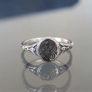 Sterling Silver Carved Oval Ring.