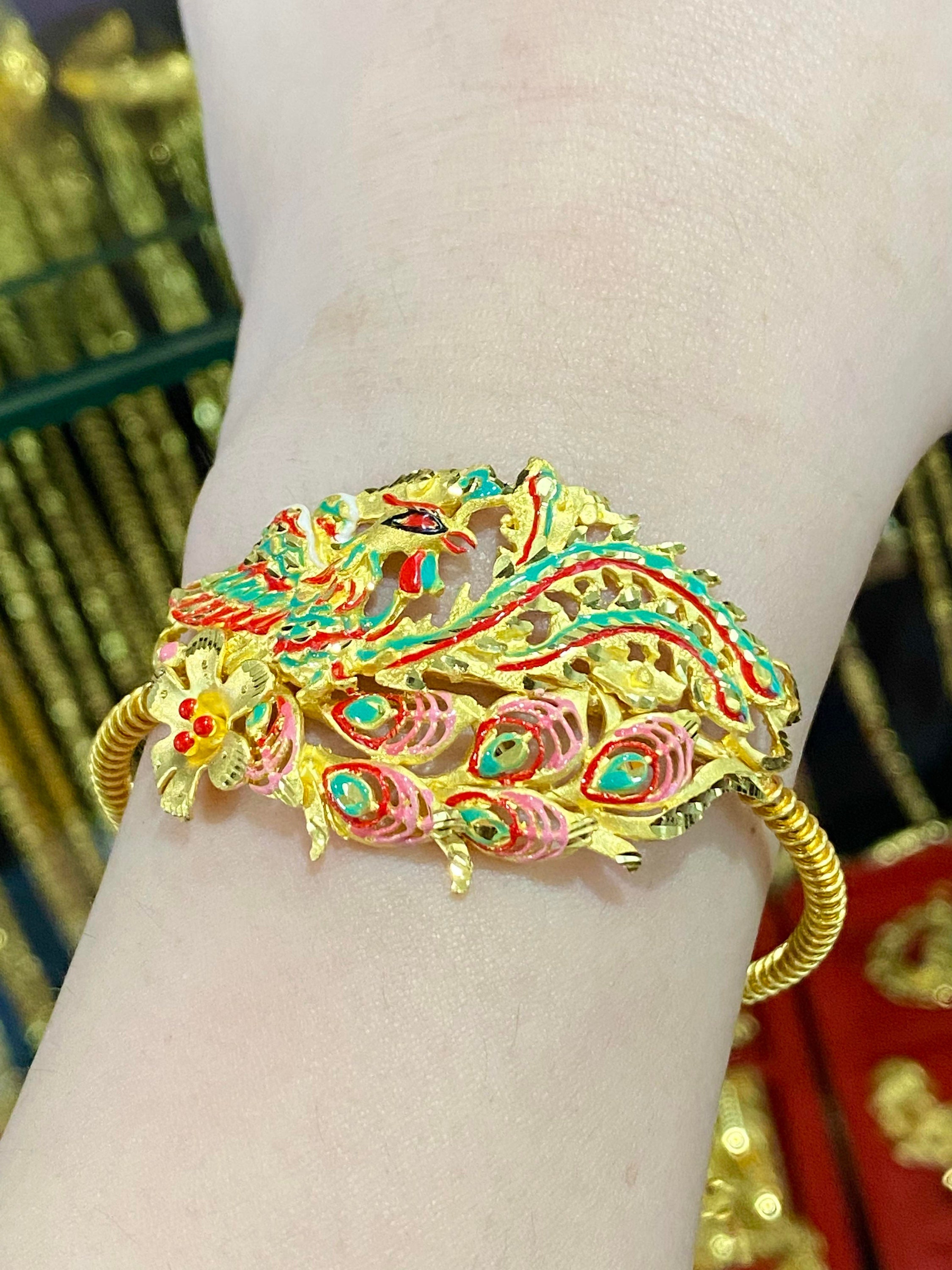 Peacock gold best sale bracelet