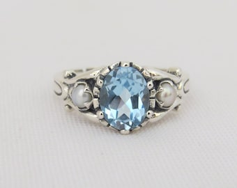 Sterling Silver Oval Aquamarine & Seed Pearl Ring.