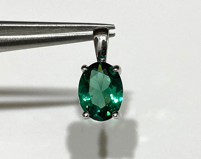 Sterling Silver Oval cut Emerald Pendant.