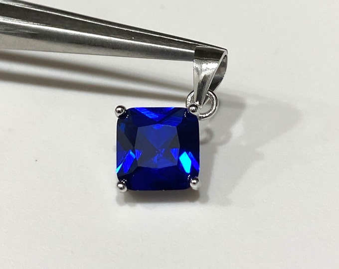 Sterling Silver Princess cut Blue Sapphire Pendant.