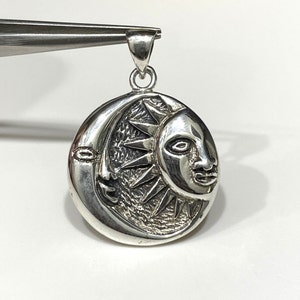Sterling Silver Sun & Moon Pendant.