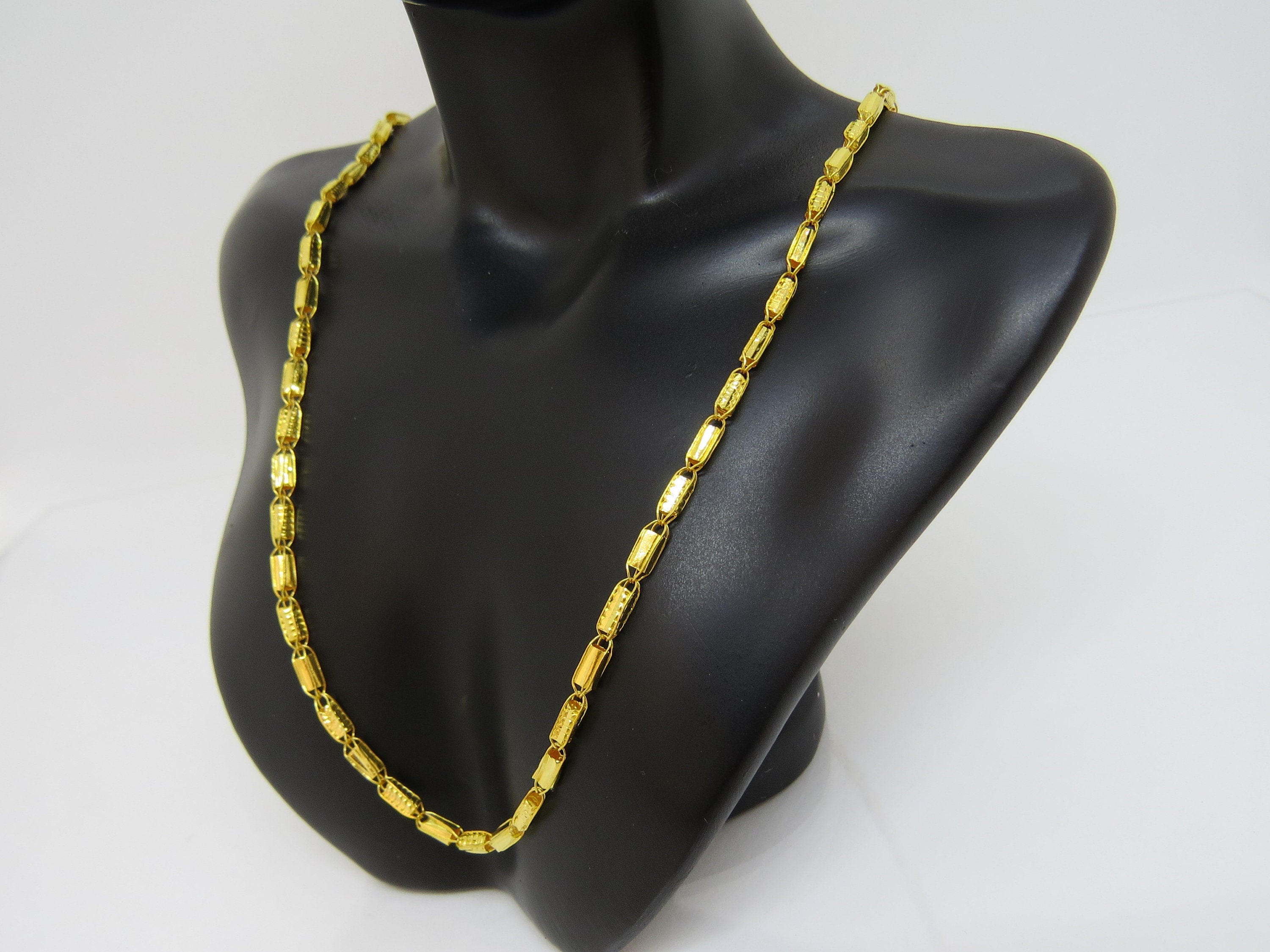 LOUIS VUITTON BLACK AND GOLD CHARM NECKLACE, 17” - alizeegarments