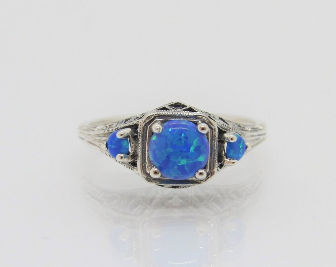 Vintage Sterling Silver Blue Opal Three stones Filigree Ring.