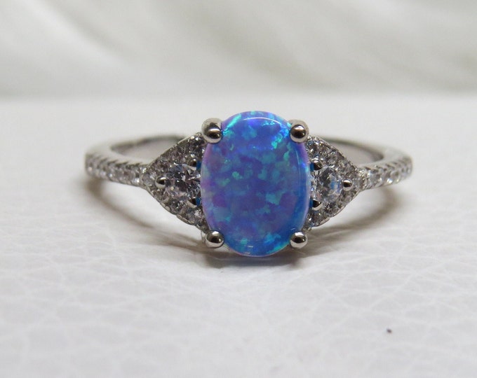 Sterling Silver Oval Blue Opal Ring.