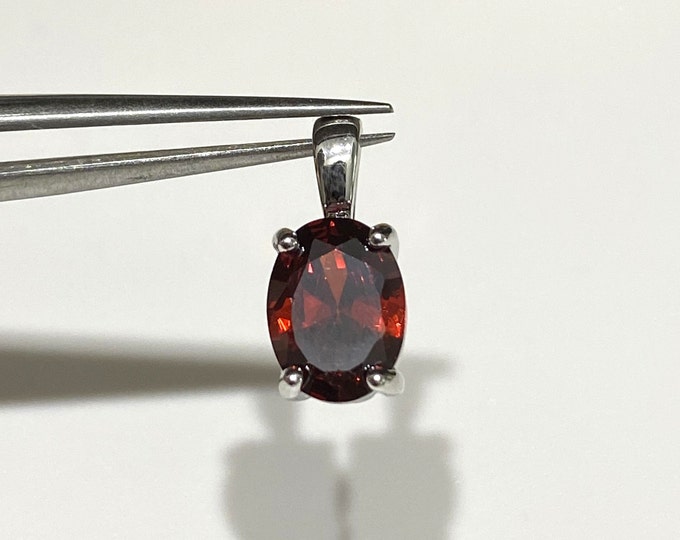 Sterling Silver Oval cut Garnet Pendant.