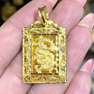 Vintage 23K 980 Solid Gold Diamond cut Dragon Pendant.