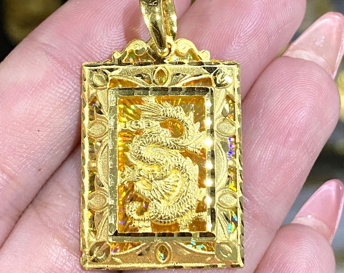 Vintage 23K 980 Solid Gold Diamond cut Dragon Pendant.