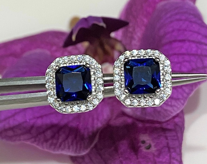 Sterling Silver Princess cut Blue Sapphire & White Topaz Earrings.