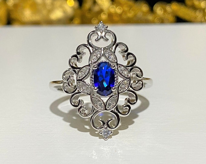 Vintage Sterling Silver Blue Sapphire & White Topaz Filigree Ring.