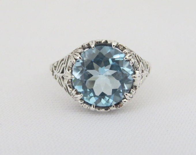 Vintage Sterling Silver Round cut Aquamarine Filigree Ring.