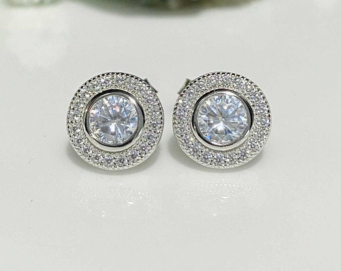 Vintage Sterling Silver Round cut White Topaz Halo Earrings.