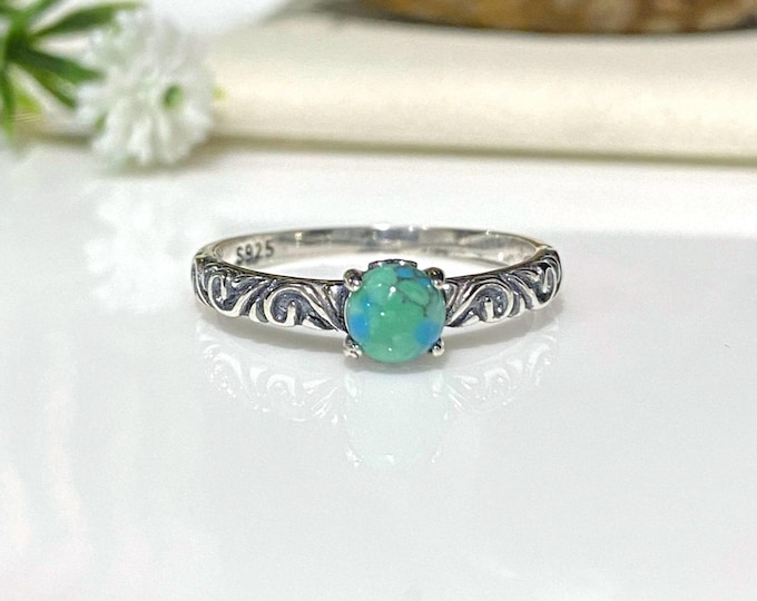 Vintage Sterling Silver Turquoise carved band Ring.