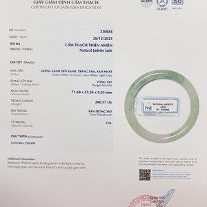 May include: A jadeite jade bangle bracelet certificate with the text "Natural Jadeite Jade" and "PNJLAB" in green and white. The certificate includes details such as the date, color, size, weight, and transparency of the jadeite jade. The certificate number is 230084.
