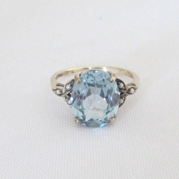 Aquamarine and clearance pearl ring