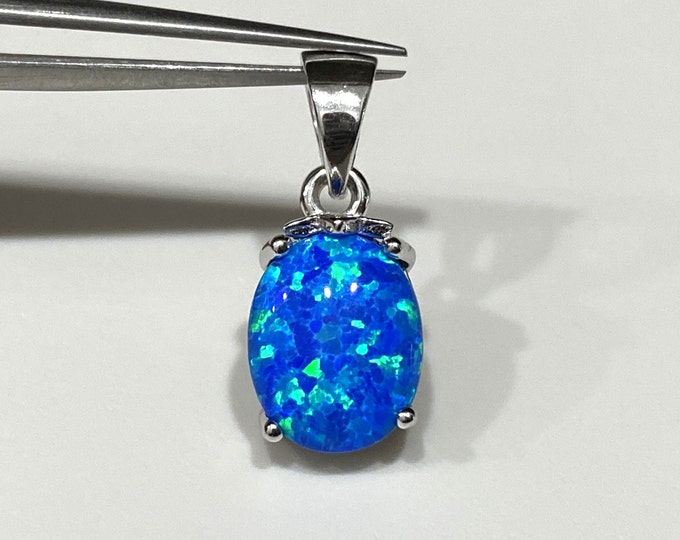 Vintage Sterling Silver Oval Blue Opal Pendant.