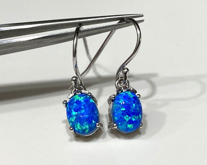 Sterling Silver Oval Blue Opal Dangle Earrings.