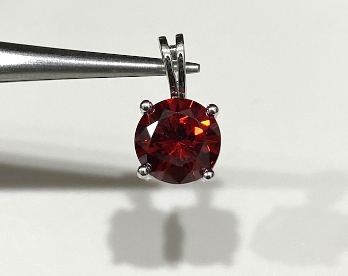 Sterling Silver Round cut Orange Garnet Pendant 7MM.