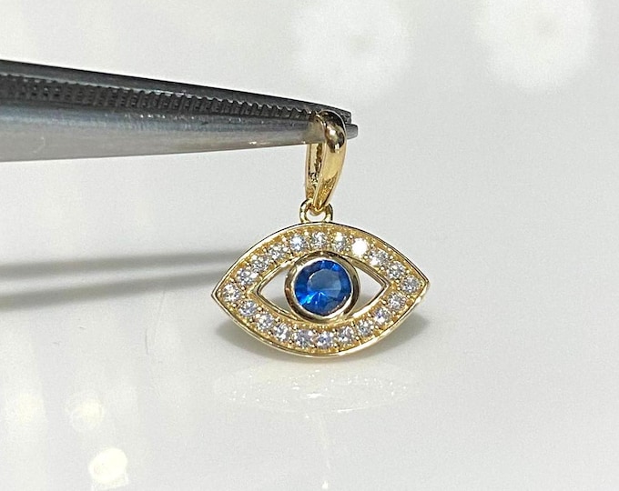 Vintage 14K Solid Gold Blue Sapphire & White Topaz Evil Eye Pendant.