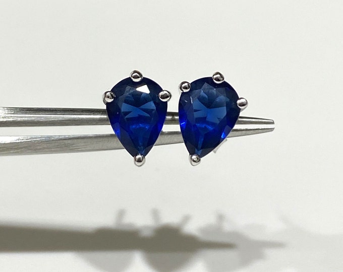 Sterling Silver Pear cut Blue Sapphire Stud Earrings.