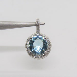 Sterling Silver Round cut Aquamarine & White Topaz Pendant