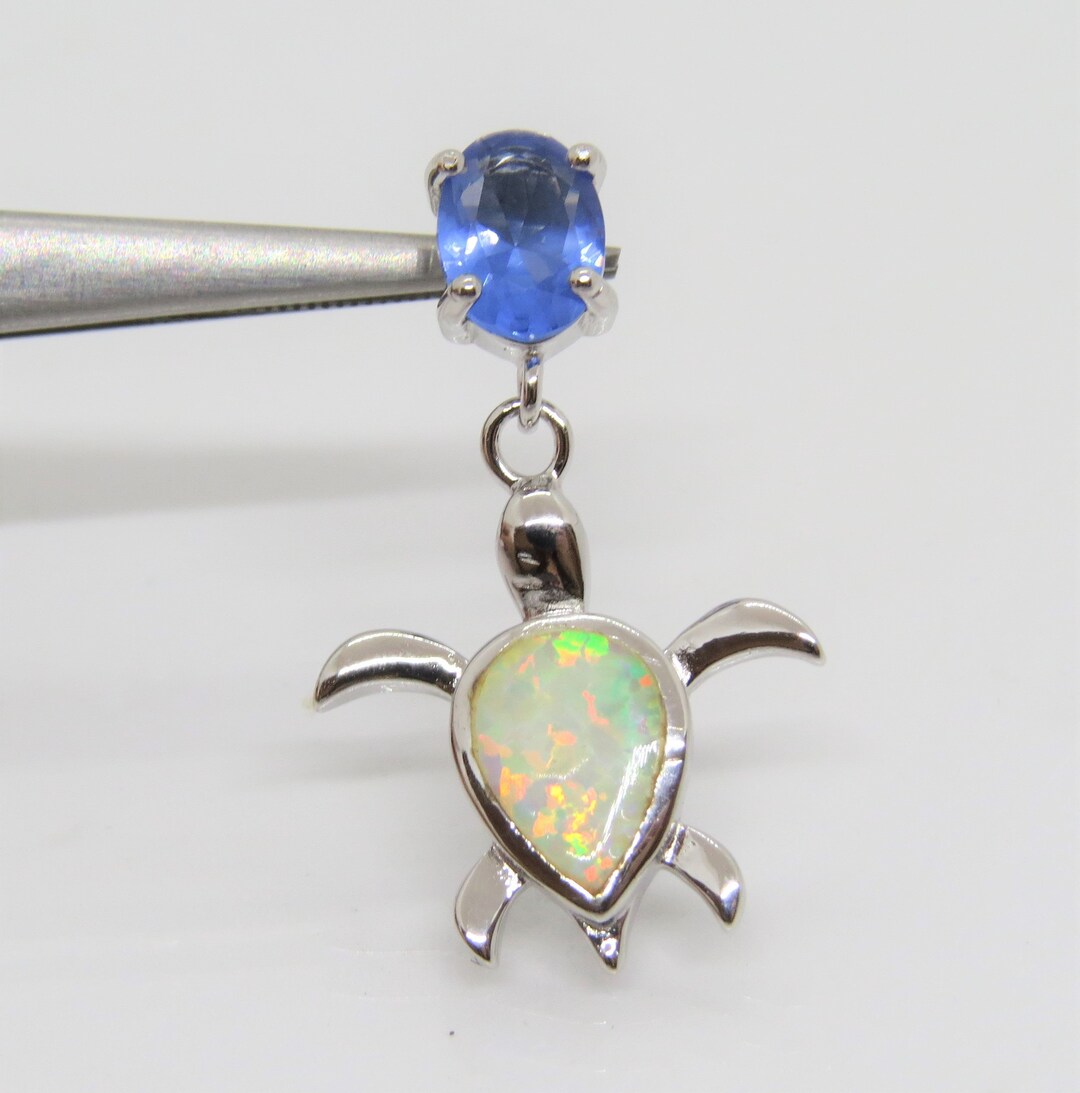 CHAÎNE PENDENTIF TIBÉTAIN FAIT MAIN TURQUOISE, PERLE ET CORAIL PÈRE CHAÎNE PENDENTIF TIBÉTAIN FAIT MAIN TURQUOISE, PERLE ET CORAIL PÈRE