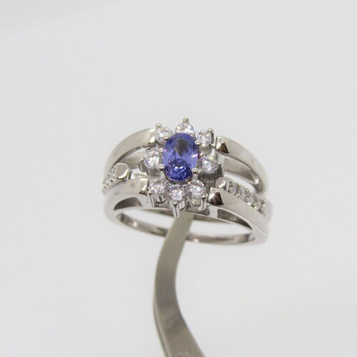 Bague vintage en argent sterling avec tanzanite des deux côtés et topaze arc-en-ciel.