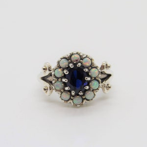 Vintage sterlingzilveren ring met saffier en witte opaal maat 10