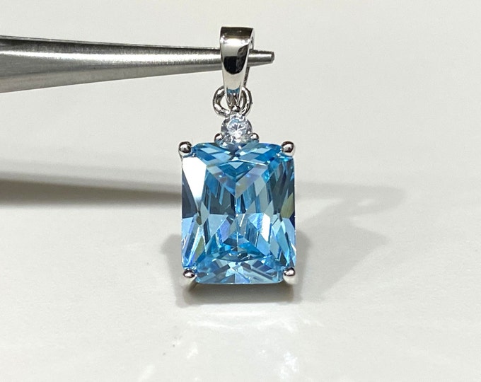 Sterling Silver Aquamarine & White Topaz Pendant.