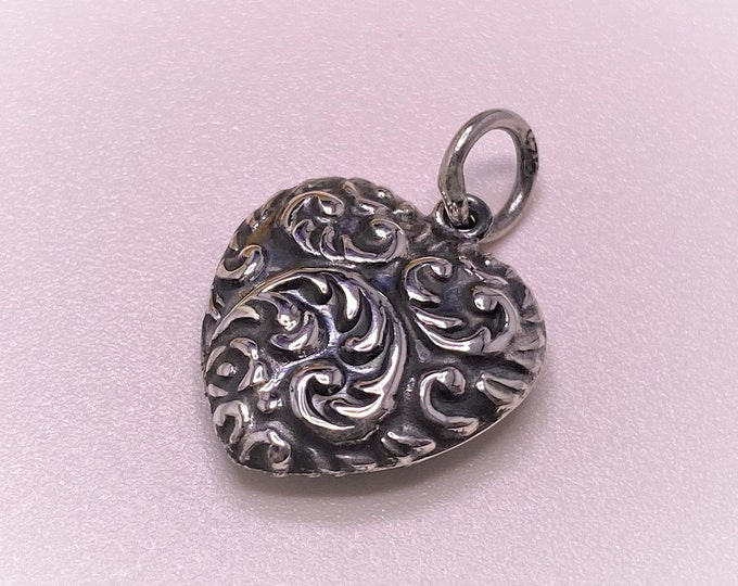 Vintage Sterling Silver Carved Heart Pendant.