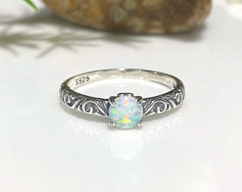 Vintage Sterling Silver White Opal carved band Ring.