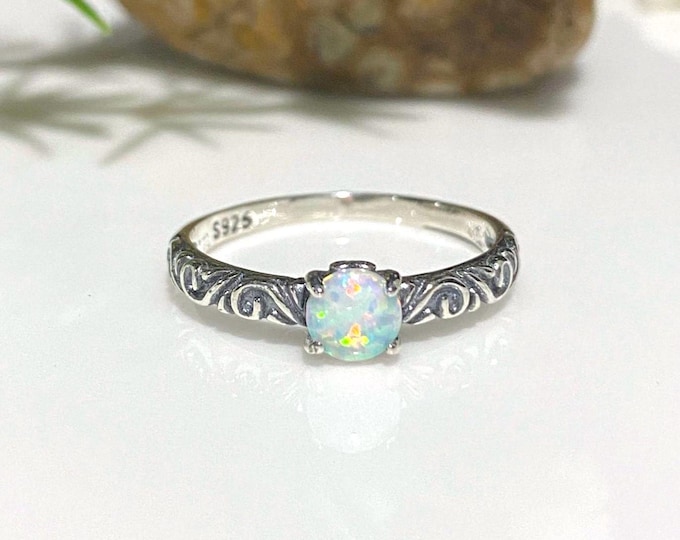 Vintage Sterling Silver White Opal carved band Ring.