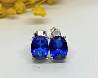 Vintage Sterling Silver Oval cut Blue Sapphire Earrings.