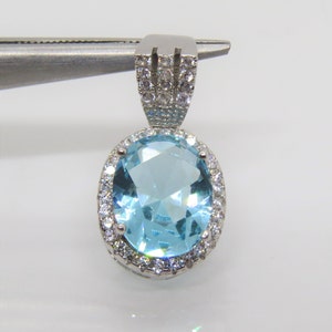 Sterling Silver Oval cut Aquamarine & White Topaz Pendant