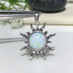 Sterling Silver White Opal Sun Pendant.