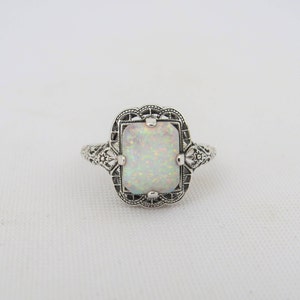 Sterling Silver Emerald cut White Opal Filigree Ring.