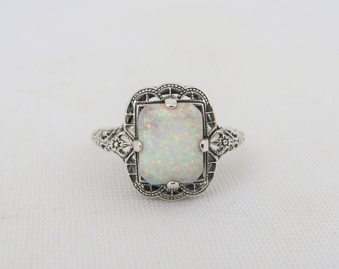 Sterling Silver Emerald cut White Opal Filigree Ring.
