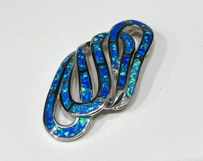 Vintage Sterling Silver Blue Opal Celtic Twisted Pendant.