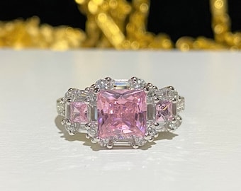Förlovningsring i sterlingsilver med vit topas och rosa safir, storlek 8