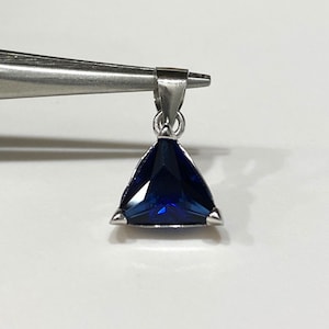 Vintage Sterling Silver Trillion Cut Blue Sapphire Pendant.