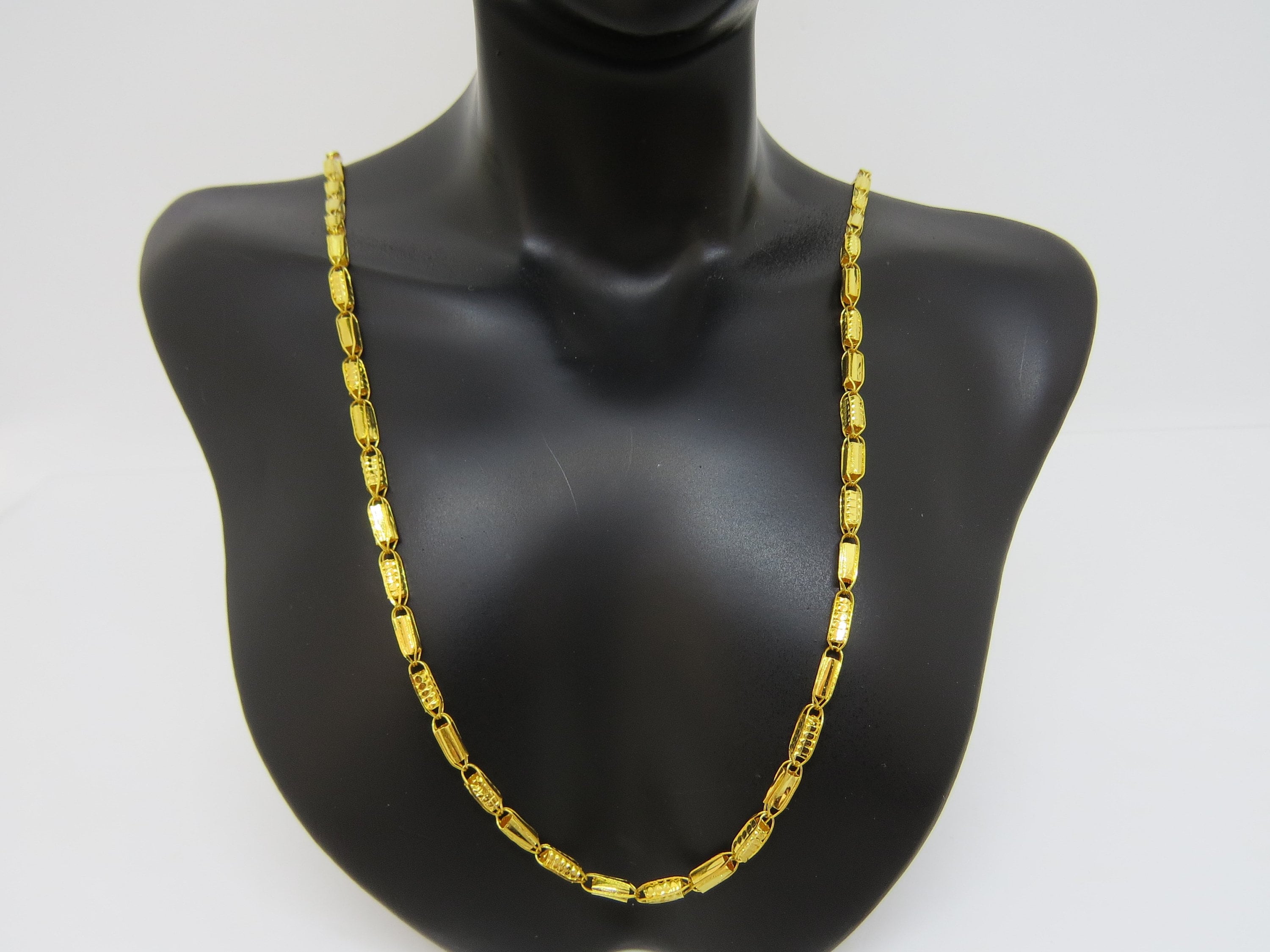 LOUIS VUITTON BLACK AND GOLD CHARM NECKLACE, 17” - alizeegarments