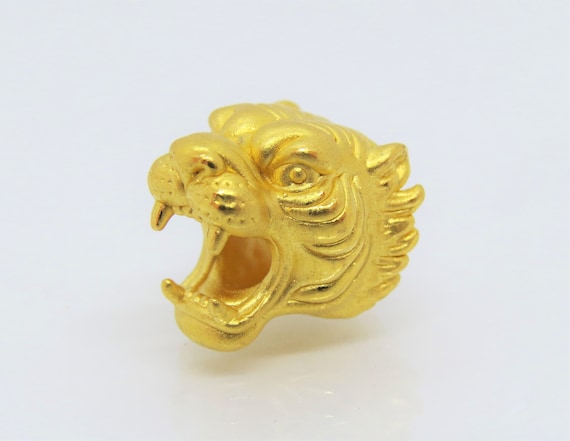 Gold tiger charm deals