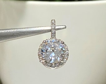 Sterling Silver Round cut White Topaz Halo Pendant.