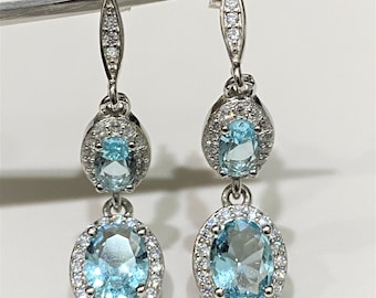 Sterling Silver Oval cut Aquamarine & White Topaz Drop Earrings.