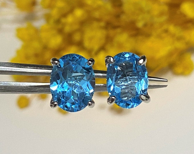Vintage Sterling Silver Natural Oval cut Blue Topaz Earrings.