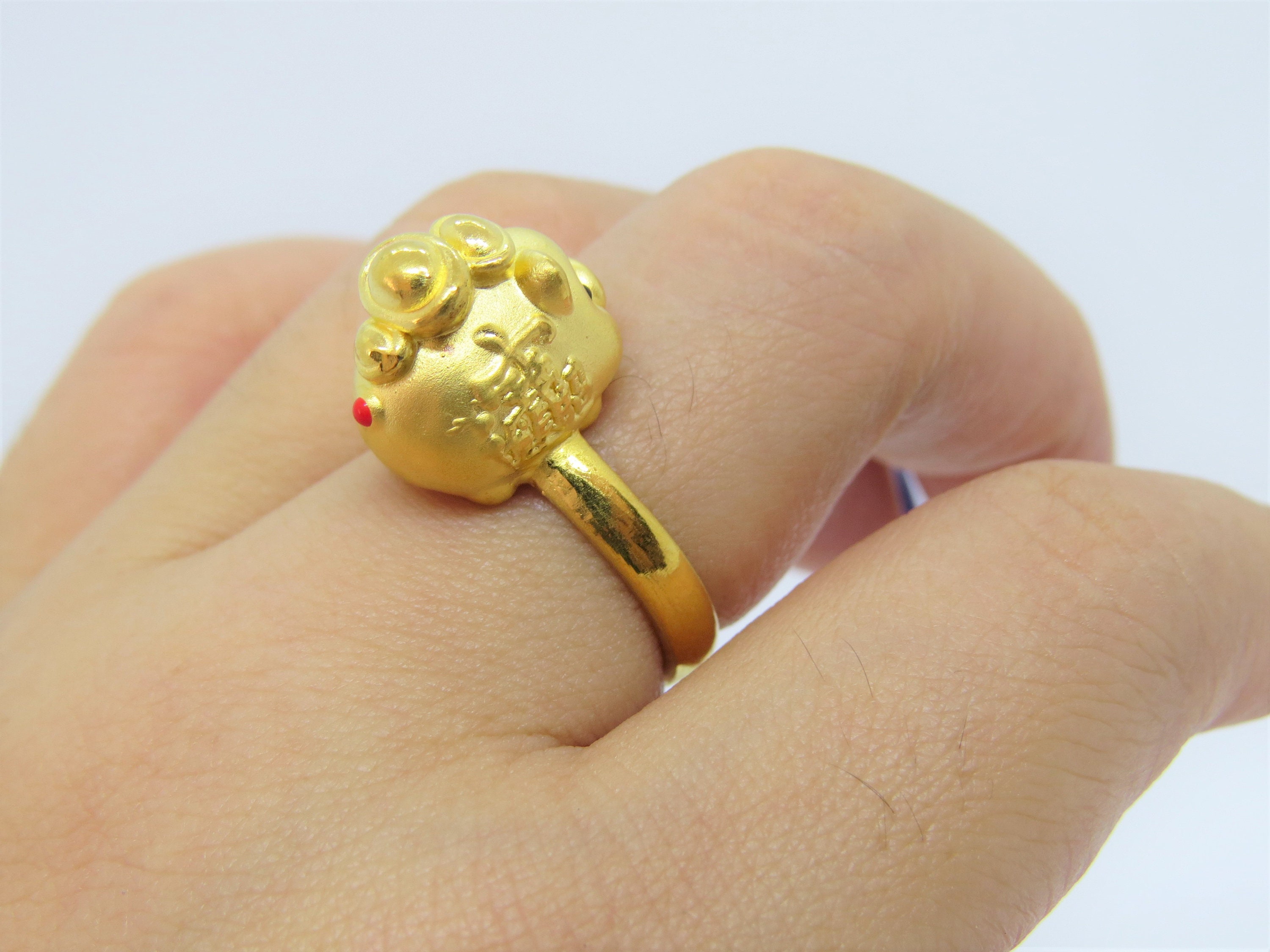 Gold pig best sale ring