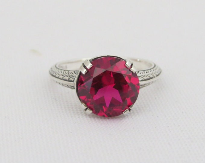 Sterling Silver Round cut Ruby Carved Ring Size 7